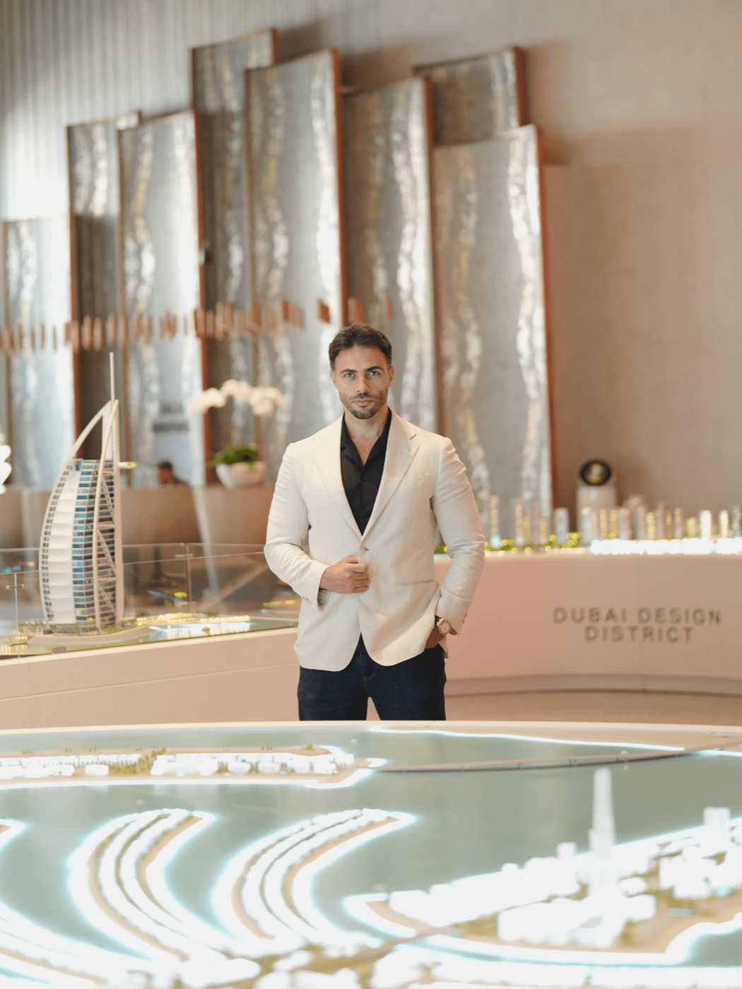 Ali Daioub at the Dubai city model — Founder, AXD Real Estate Dubai